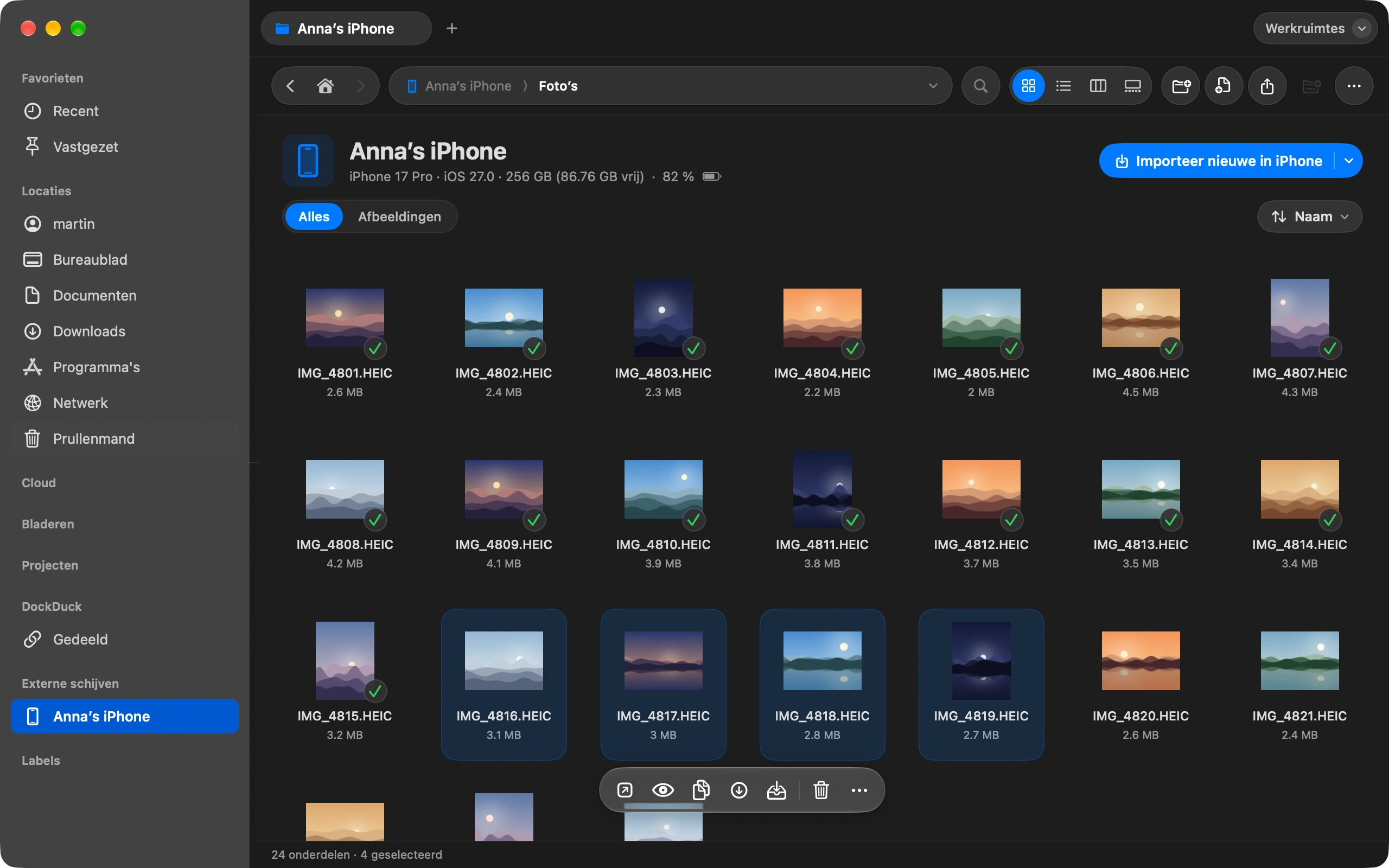 Kopieer wat je wilt: Sleep foto’s naar een map op je Mac, of selecteer ze en kies Kopieer naar Downloads.