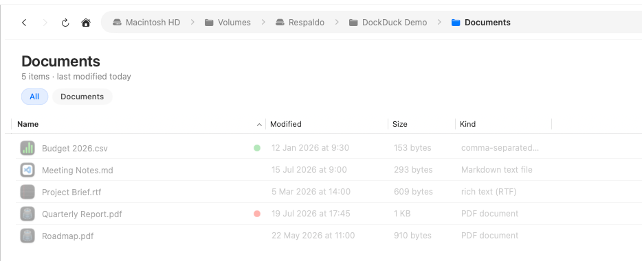 A file listing with cut items dimmed to show they are pending a move